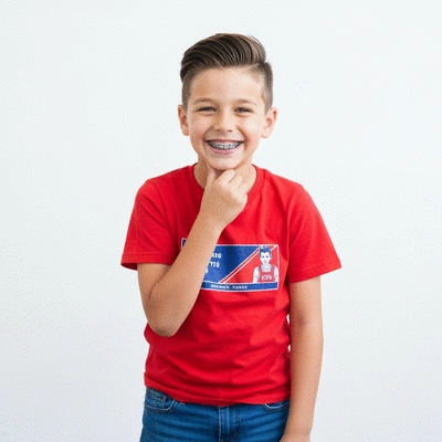 Child smiling with braces, happy and confident
