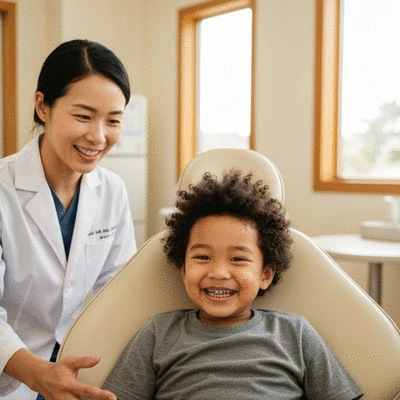 Child smiling during an orthodontic follow-up appointment, professional and reassuring atmosphere, no text, no words, no typography, 8K