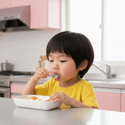 Child eating with focused expression, showing proper swallowing technique in a bright, clean environment