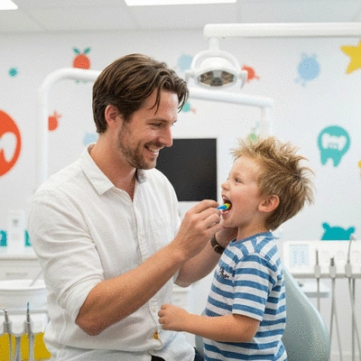 Parent and child discussing dental hygiene with an orthodontist